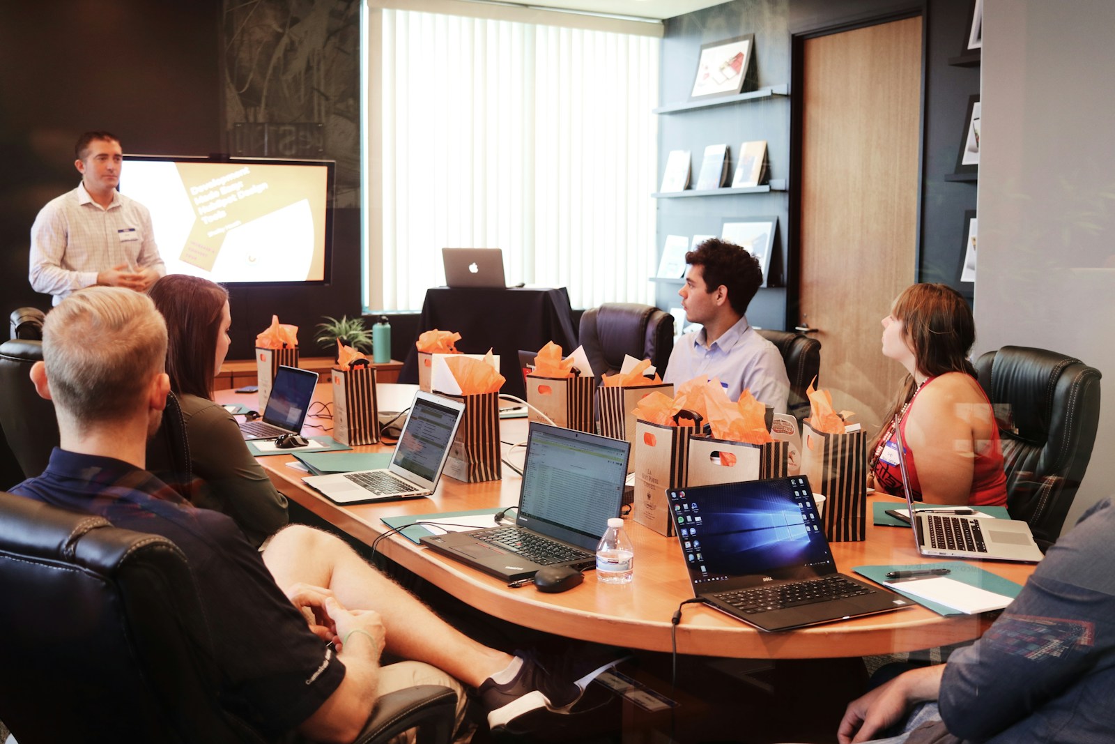 Client direction session reviewing brand visual concepts at VisualForge AI studio